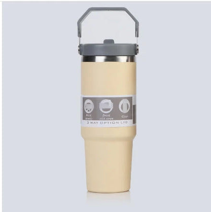 Insulated stainless steel travel tumbler with double-wall vacuum technology, sweat-proof powder coating, and BPA-free sliding lid for hot and cold drinks on the go.