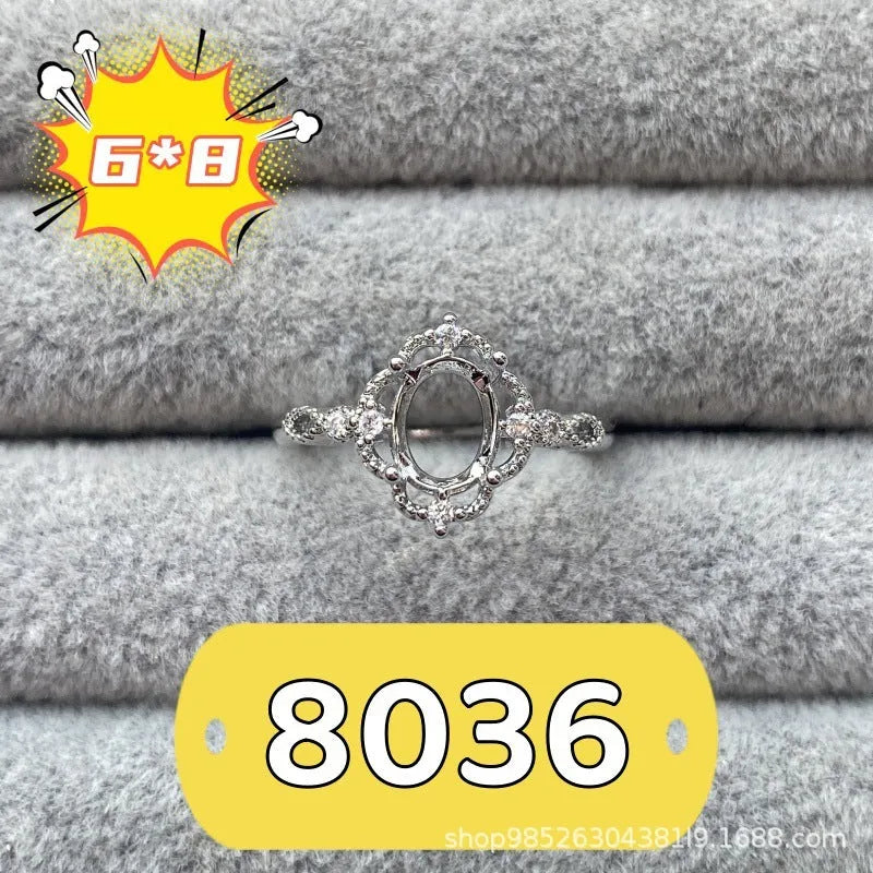 Oval denier ring with open mouth design showing 6*8mm main stone and five-pointed star decoration