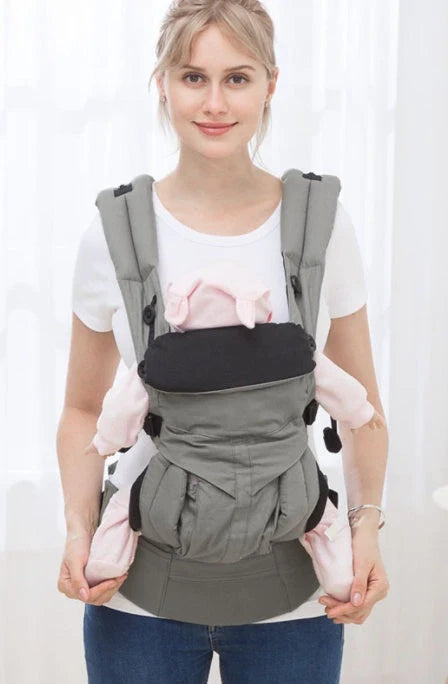 Multifunctional baby carrier in various colours with adjustable waistband and small bag