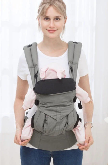 Multifunctional baby carrier in various colours with adjustable waistband and small bag