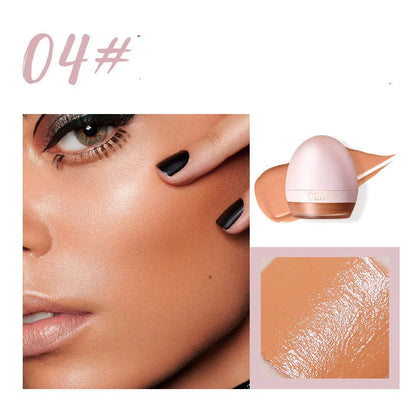 4-colour foundation cream compact with built-in sponge and small spoon applicator