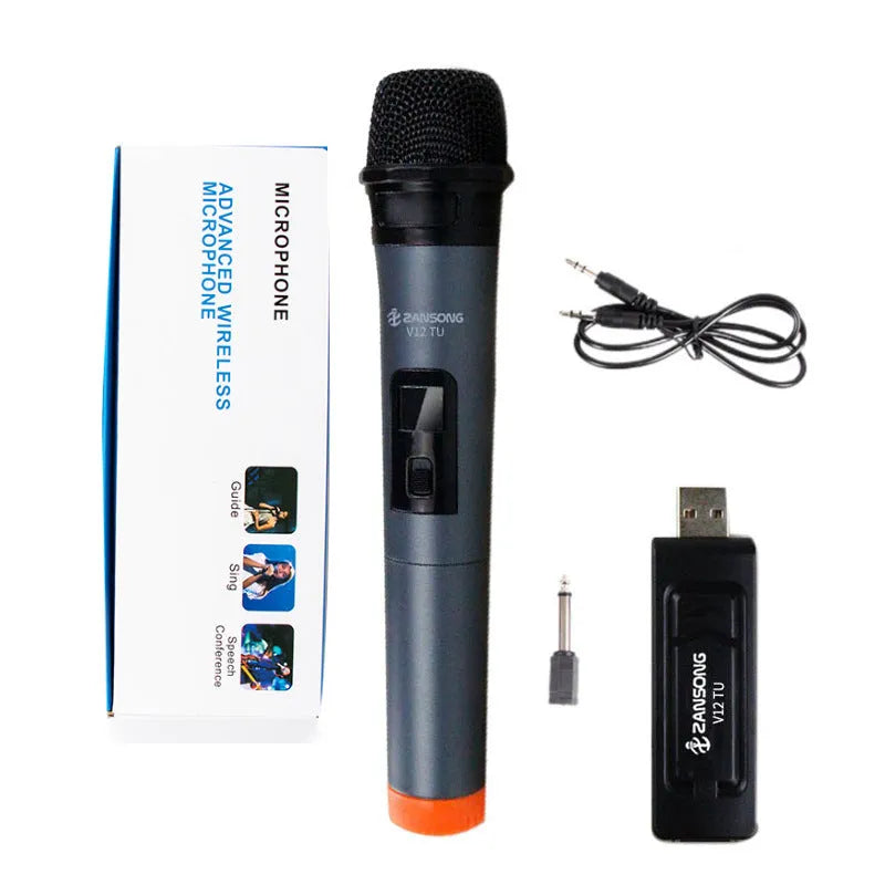Black dynamic microphone with metal grill, USB receiver, adapter, and audio cable on dark background