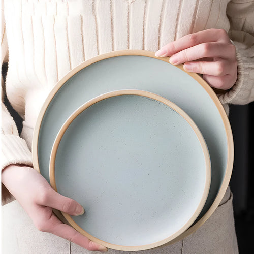 10-inch blue matte ceramic dinner plate with sesame point glaze finish