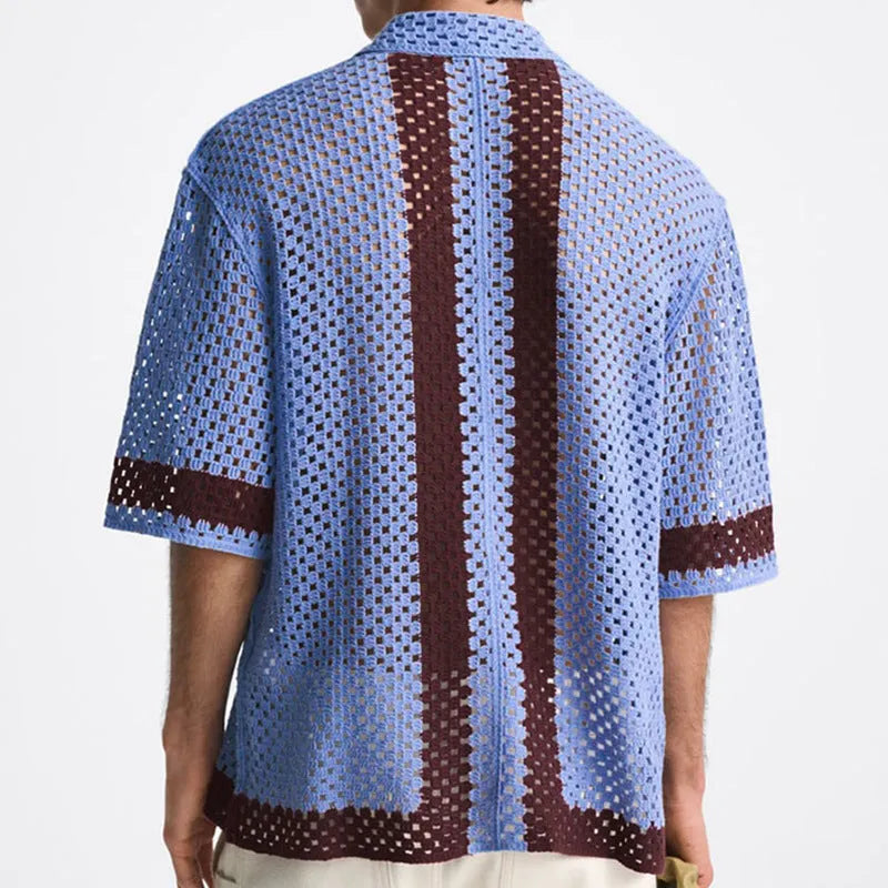 Men's blue hollow knit viscose cardigan with short sleeves and open front, shown on model