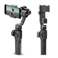 Black mobile phone shooting stabilizer handheld gimbal with smartphone mounted