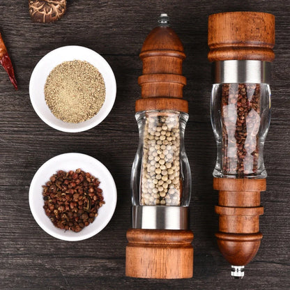 Wooden Salt and Pepper Grinder Set with adjustable coarseness on kitchen table