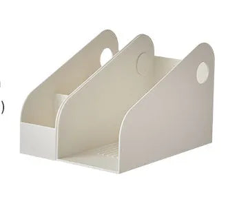 Plastic desktop storage box with two grids in milk coffee colour on a wooden desk.