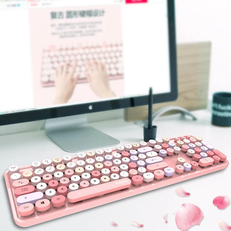 Sweet lipstick mixed colour wireless keyboard and mouse set with colourful key caps and small USB receiver on desk