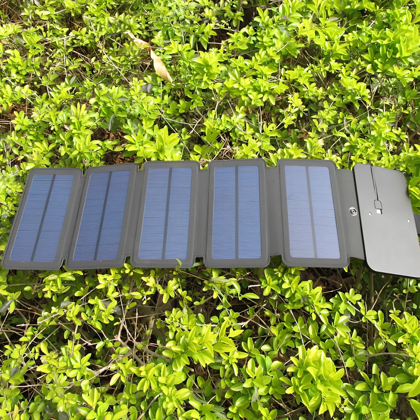 8W folding solar charger with expanded monocrystalline panel showing USB output port