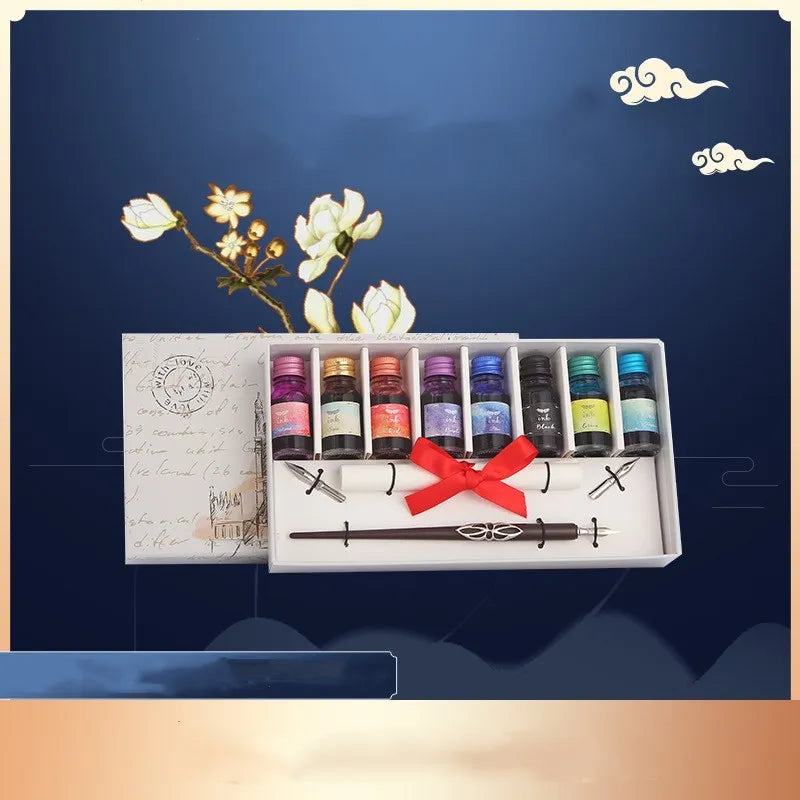 Wooden dip pen calligraphy gift set with coloured ink bottles in a storage box.