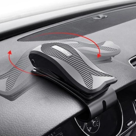 Black magnetic car phone holder with 360-degree rotation mounted on car vent