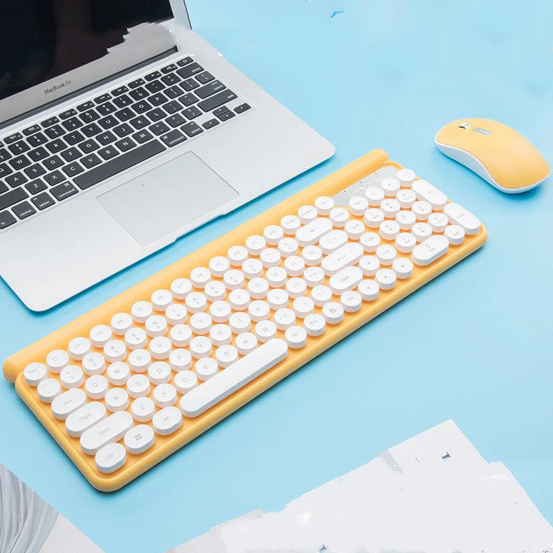 Ergonomic wireless keyboard and mouse set with charging capability, available in yellow, black, and green.