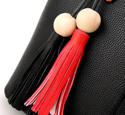 Women's black PU slung shoulder bag, 25cm height, adjustable strap for diagonal carry with phone and wallet inside