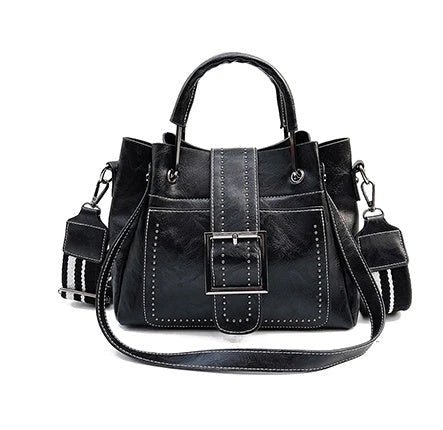 Stylish double-layer cowhide leather bucket bag with chic hardware accents, available in black, pink, and brown colors