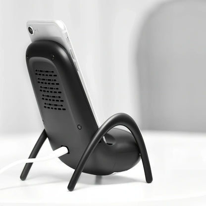 Black amplified wireless charger with bracket, 9.8 x 9.8 x 14.2 cm, for phone charging and audio boost