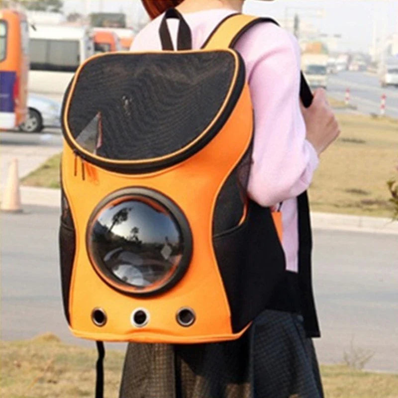 Astronaut-inspired pet carrier backpack with spacious compartment for cats and dogs