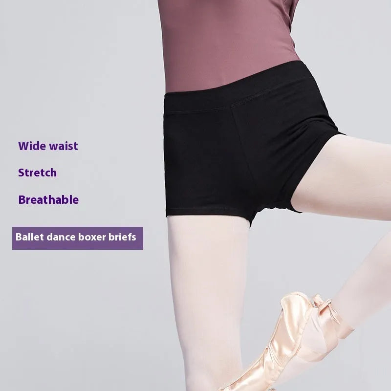 Black cotton women's dance practice trousers laid flat, showing solid colour and simple design.