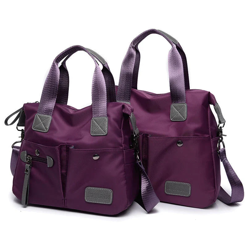 A versatile ladies handbag with convertible styles, featuring multiple exterior pockets and interior compartments for optimal organization.