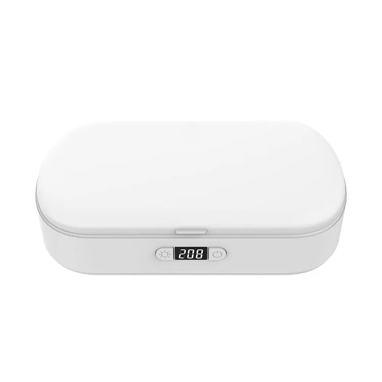 White UV sterilisation box with wireless charging for mobile phones and small personal items.