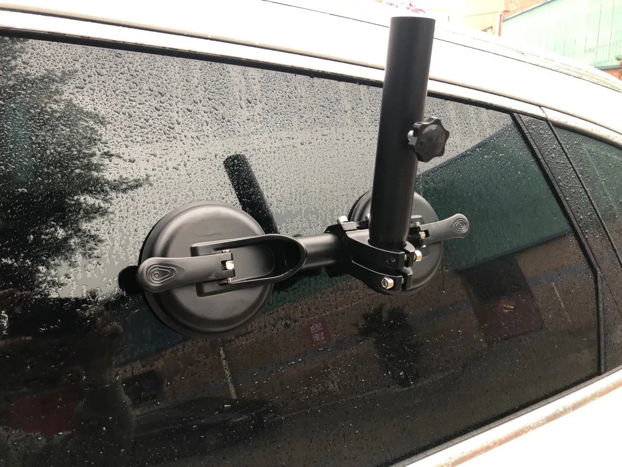 Black ABS plastic and rubber car window sucker base for mounting flagpoles to vehicle glass