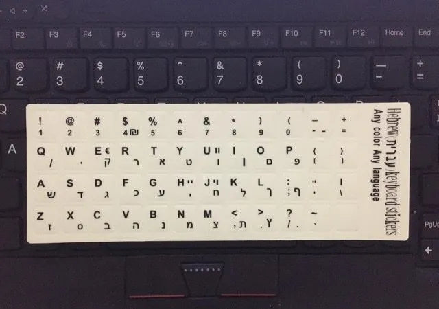 Yellow PVC keyboard stickers with glowing multilingual characters for desktop and laptop computers