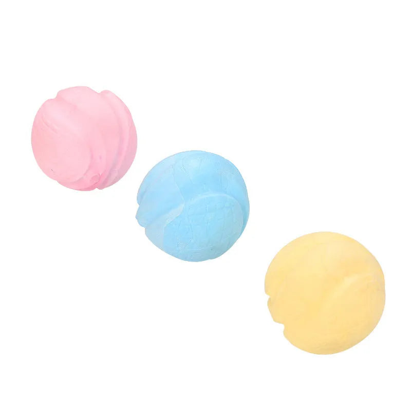 Blue TPR foam solid ball dog toy on a plain background