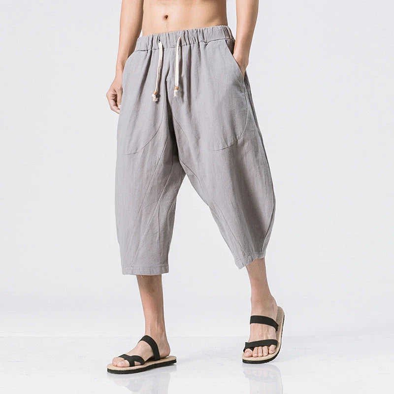 Comfortable and stylish harem pants in various colors and sizes, featuring a drawstring waist and wide leg design for relaxed casual wear.