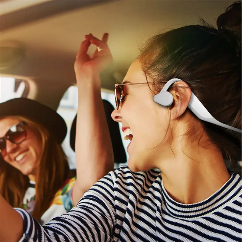 5.0 stereo bone conduction headphones in black, hanging ear design with bilateral drivers