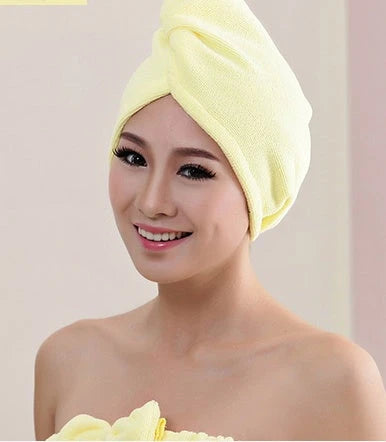 Absorbent microfiber hair turban in various vibrant colours, designed for fast and convenient drying