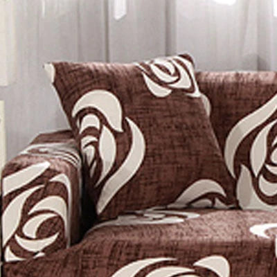 Printed stretchable sofa slipcover covering a three-seater sofa in a modern geometric pattern