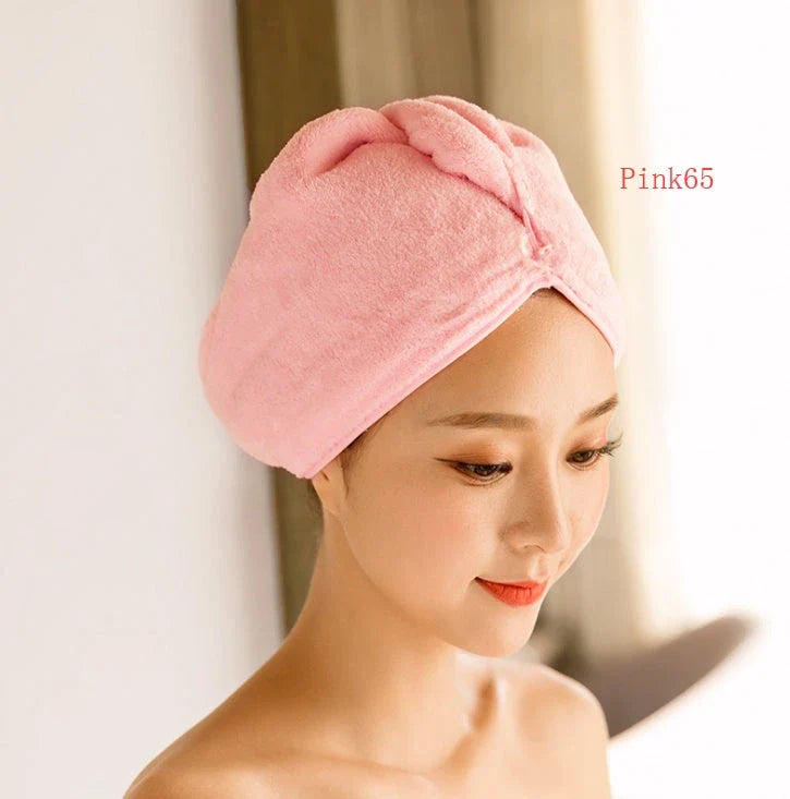 Absorbent microfiber hair turban in various vibrant colours, designed for fast and convenient drying