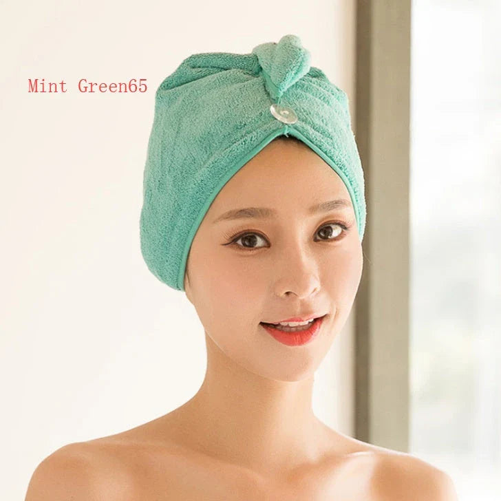 Absorbent microfiber hair turban in various vibrant colours, designed for fast and convenient drying