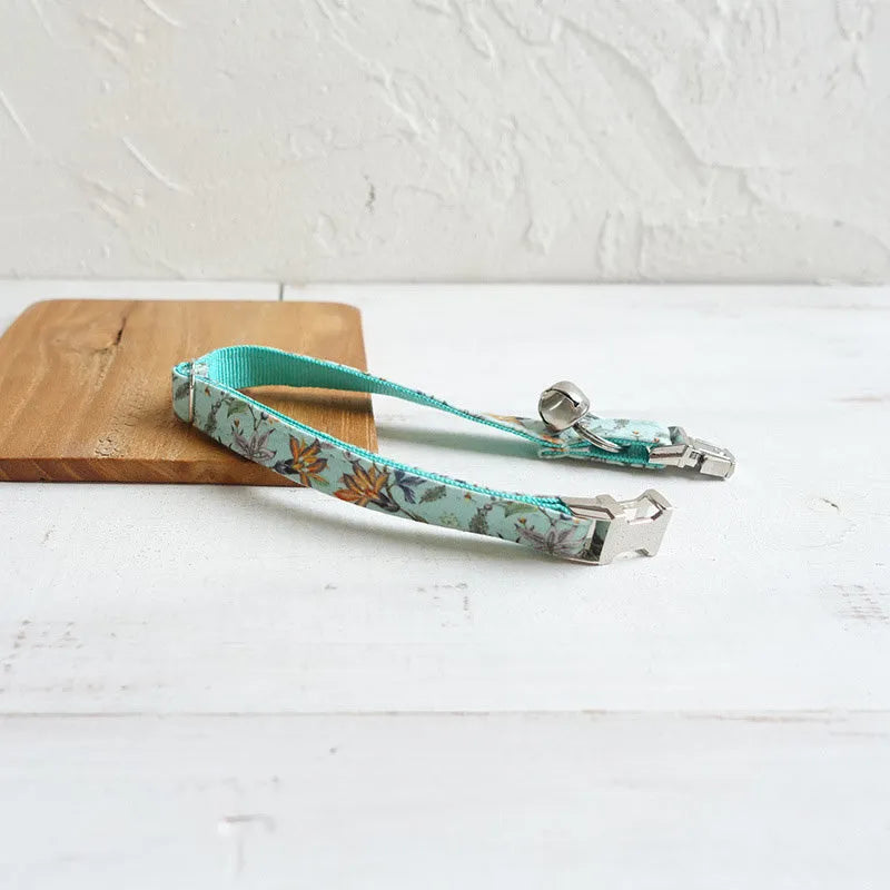 Green adjustable pet collar made from cloth and webbing suitable for dogs and cats with two sizes S and L