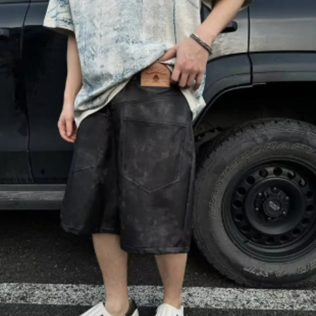 Korean loose-fit men's T-shirt with a full blue tie-dye print and short sleeves.