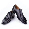 Men's purple leather Oxford shoes with hand-carved detailing and pointed toe