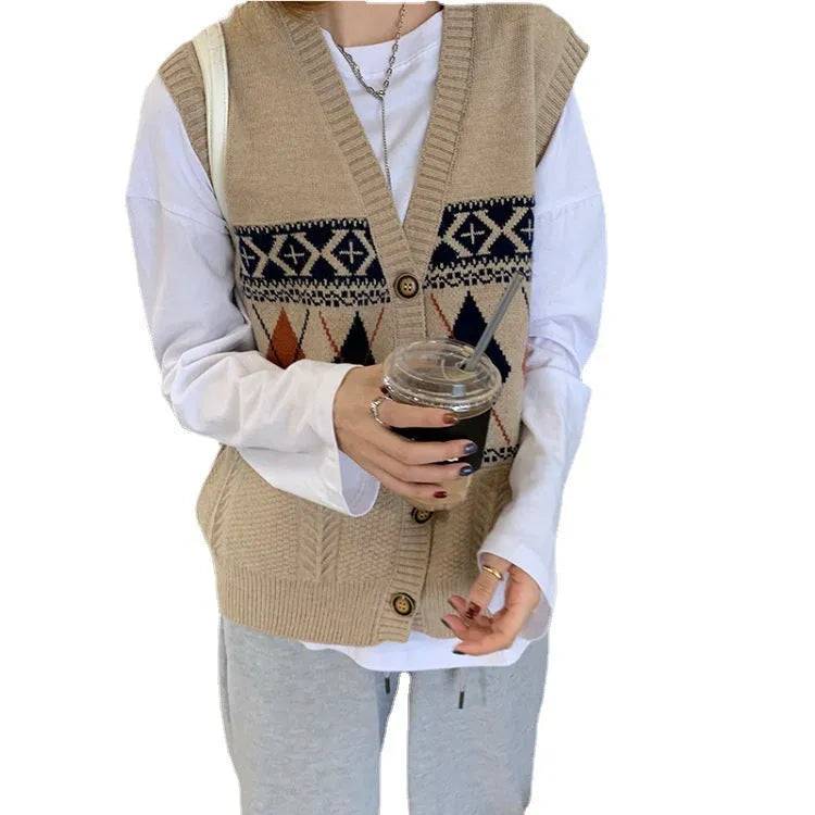 Khaki diamond plaid sleeveless cardigan on a hanger, showing loose fit and open front.