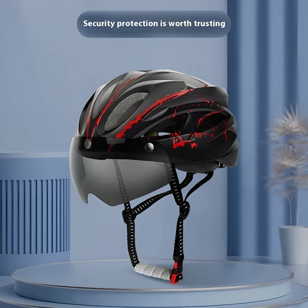 Bicycle helmet with LED light and goggles in lightning black and red colour on a neutral background