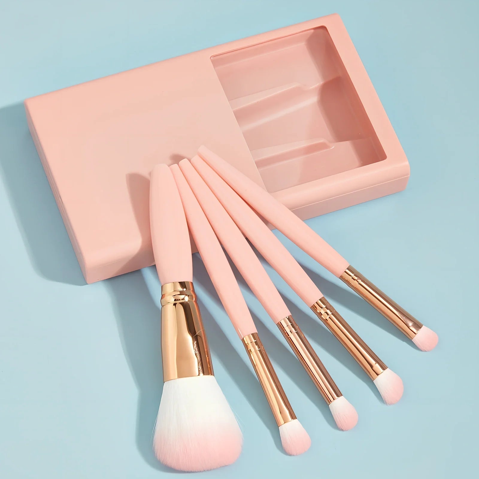 Sky blue 5-piece makeup brush set with plastic handles and travel mirror box, compact for bags