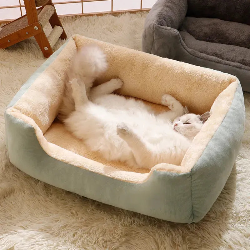 Short plush cat bed for pets shown in one of five colours and available in five sizes.