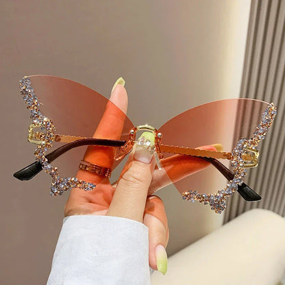 Luxury diamond-studded butterfly sunglasses in various gradient color options, featuring a vintage-inspired design and high-quality materials for a fashionable and glamorous look.