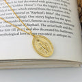S925 sterling silver vintage embossed portrait coin-style pendant in gold finish on white background