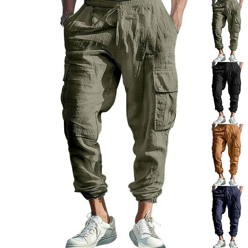 Man wearing loose khaki linen trousers with ankle-tied cuffs, drawstring waist, and multiple pockets.