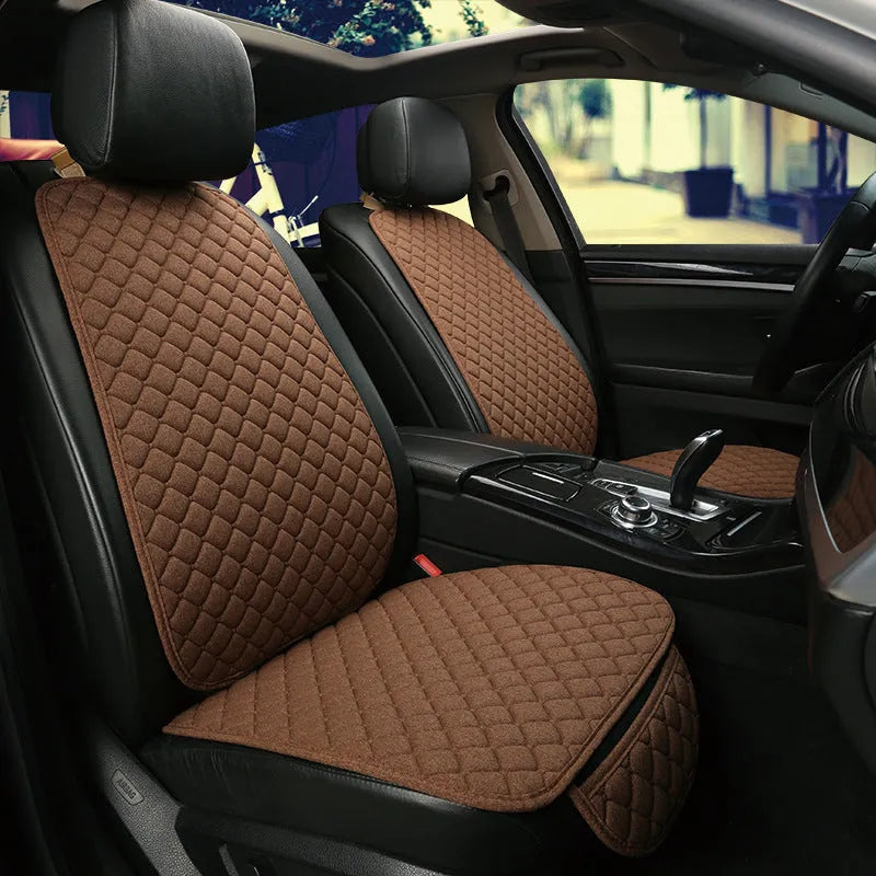 Linen car seat cushion in six colour variations showing decorative enhancement on vehicle seat