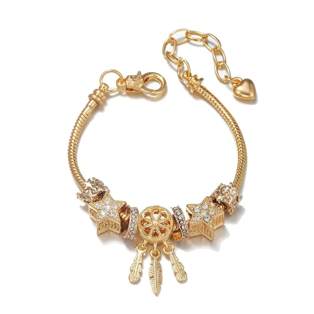 Unisex alloy bracelet with dreamcatcher pendant and star bead, KC gold finish, lobster clasp
