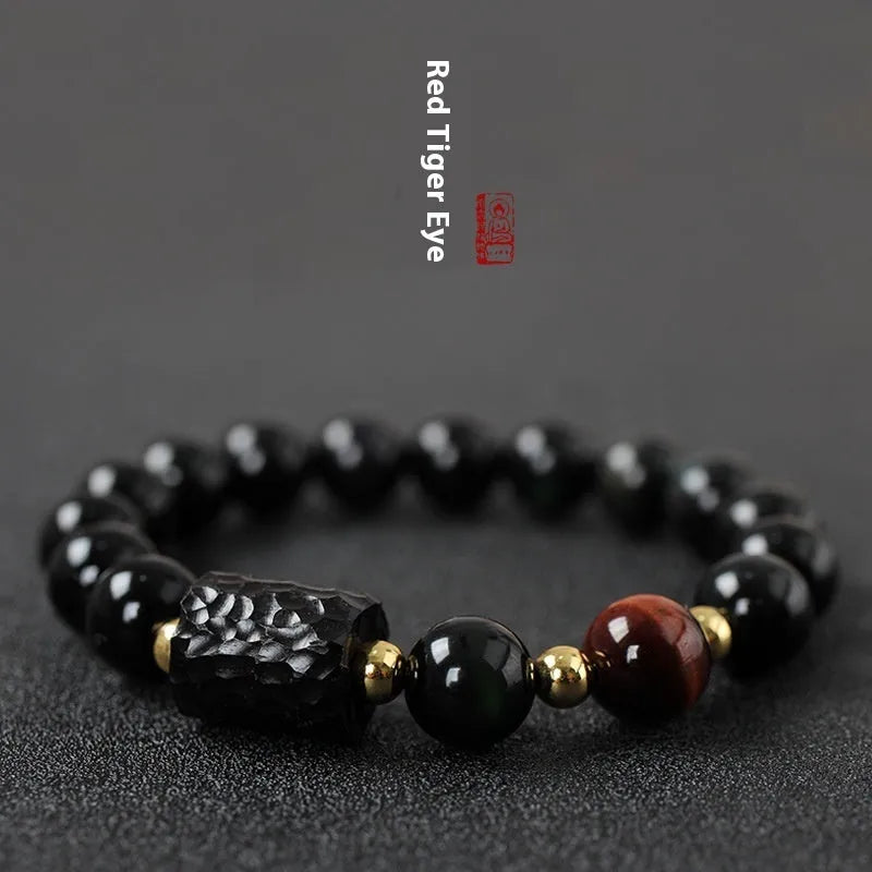 Handmade obsidian bracelet with red and yellow tiger eye stone beads