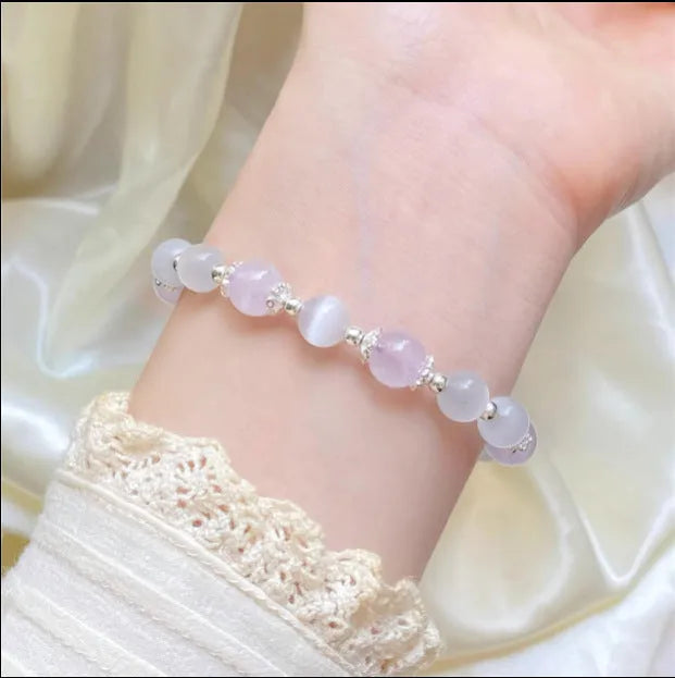 Handmade opal amethyst crystal bracelet with a cute moon shape charm.