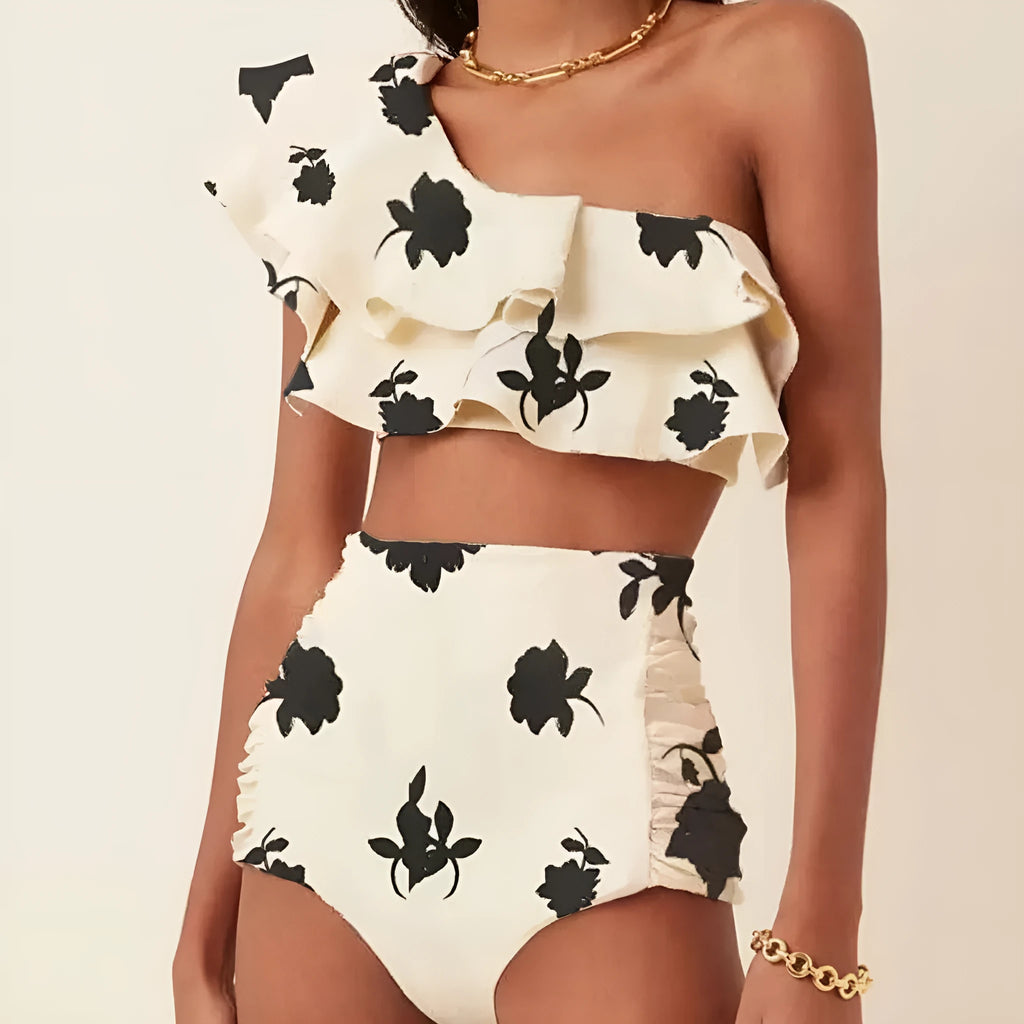 Women's printed high waist bikini suit with shoulder ruffles in a floral pattern.