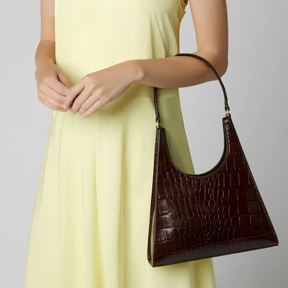 Women's white triangle shoulder handbag with crocodile pattern and magnetic buckle closure