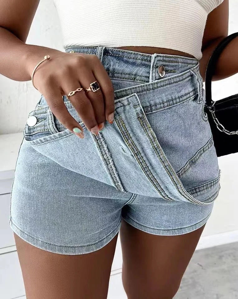 Stylish Y2K-inspired denim shorts with an asymmetrical hem, offering a trendy and comfortable fit.