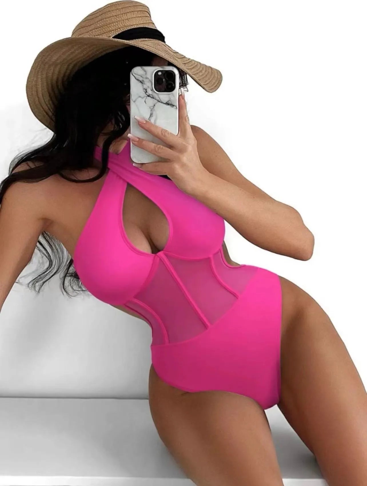 Women's black one-piece swimsuit bikini made from nylon and spandex fabric on mannequin